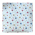 Flat lay of the Baby Shark™ x Roo & You™ Play Mat fabric with colorful characters.
