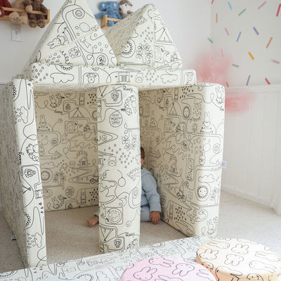 Toddler playing with Miffy™ x Roo & You™ Joey Play Couch covered in bunny print.