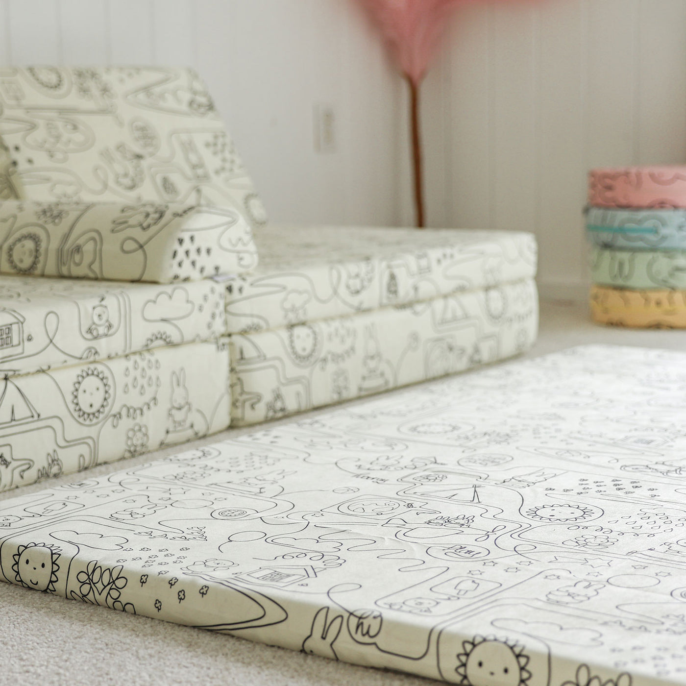 Playroom with Miffy™ x Roo & You™ Joey Play Couch and play mat covered in bunny print.